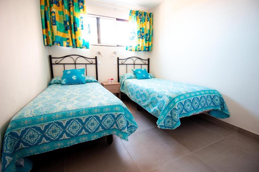 Postel nebo postele na pokoji v ubytování Apartamento en Las Flores I