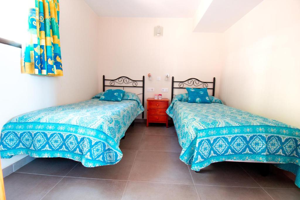 Postel nebo postele na pokoji v ubytování Apartamento en Las Flores I