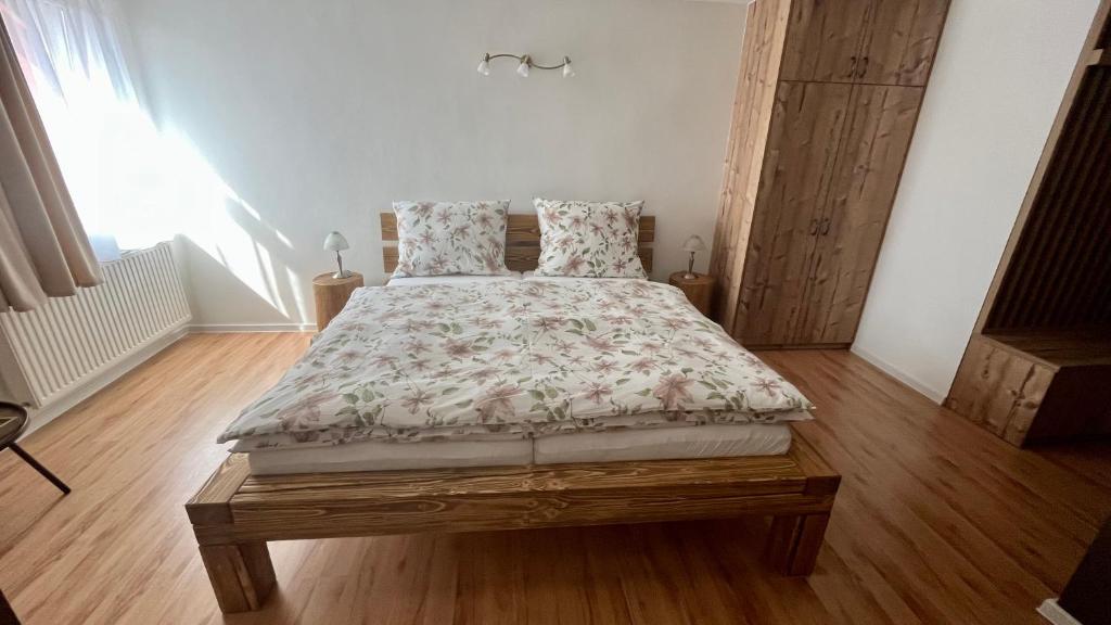 Postel nebo postele na pokoji v ubytování Apartmány Stanos Bikes