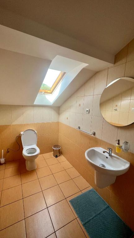 Koupelna v ubytování Apartmány Stanos Bikes