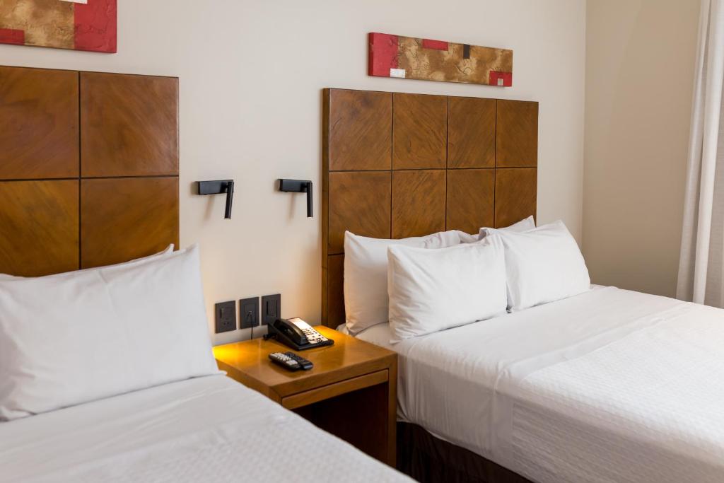 Postel nebo postele na pokoji v ubytování Crowne Plaza Asunción by IHG