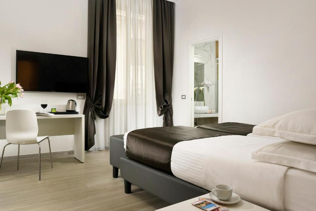 TV a/nebo společenská místnost v ubytování Hotel Patria