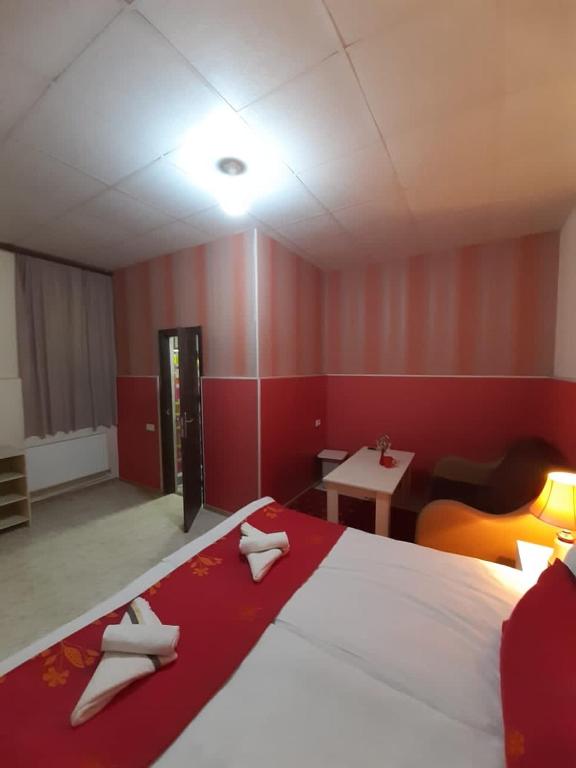 Postel nebo postele na pokoji v ubytování Lind Hotel and Guest House