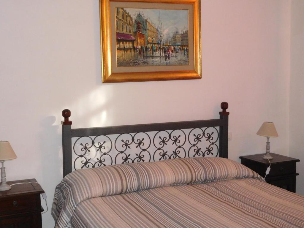 Een bed of bedden in een kamer bij Gli Ulivi