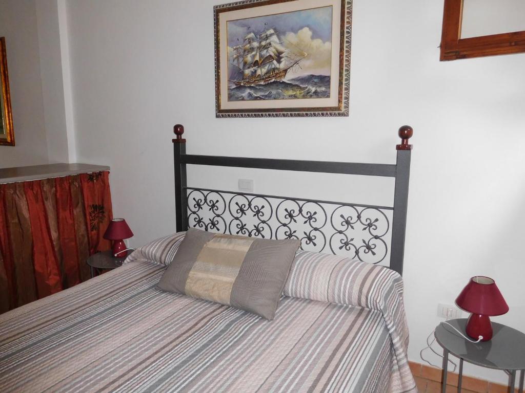 Een bed of bedden in een kamer bij Gli Ulivi