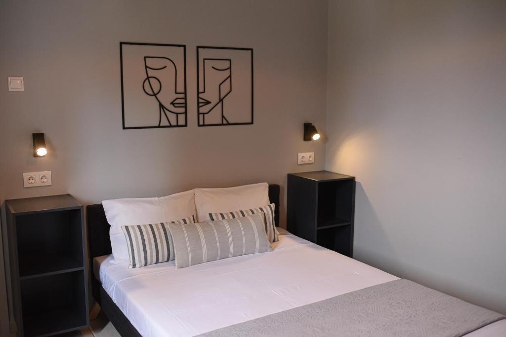 Postel nebo postele na pokoji v ubytování Vasilios Marinos Rooms