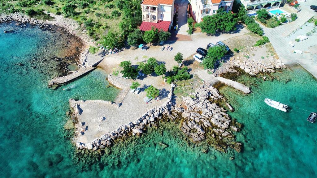 an aerial view of a small island in the water at Ferienhaus Elena, Karlobag in Karlobag