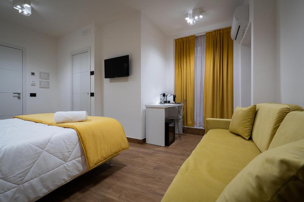 Postel nebo postele na pokoji v ubytování Sofi' Center Rooms