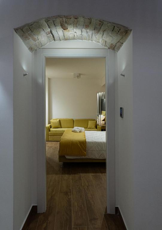 Postel nebo postele na pokoji v ubytování Sofi' Center Rooms