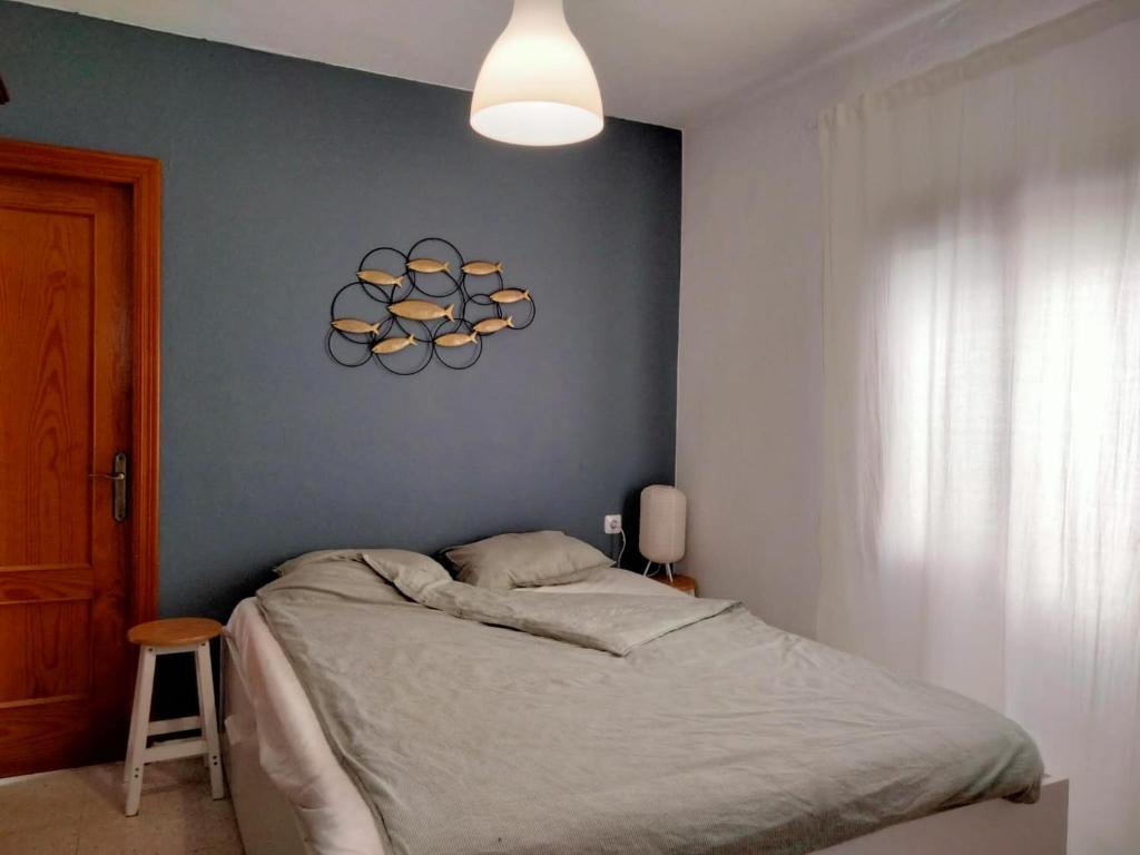 Posteľ alebo postele v izbe v ubytovaní Nice appartment in center of old town Tarifa
