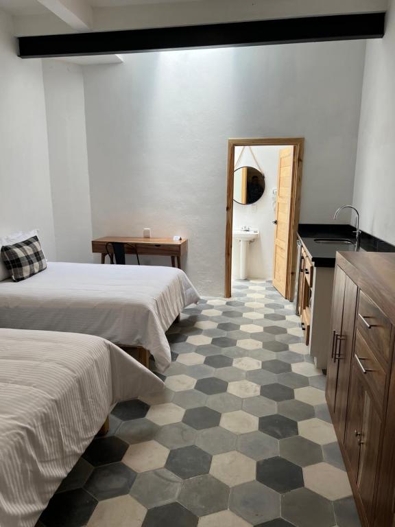 Postel nebo postele na pokoji v ubytování Hostal de la Montaña