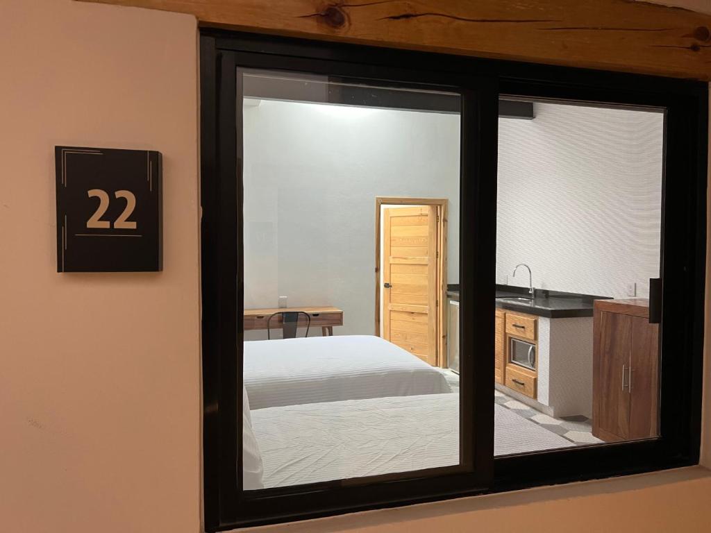Postel nebo postele na pokoji v ubytování Hostal de la Montaña