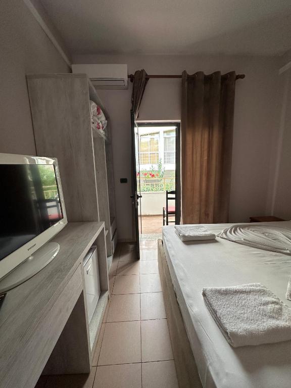 Postel nebo postele na pokoji v ubytování Seashell Beach Rooms