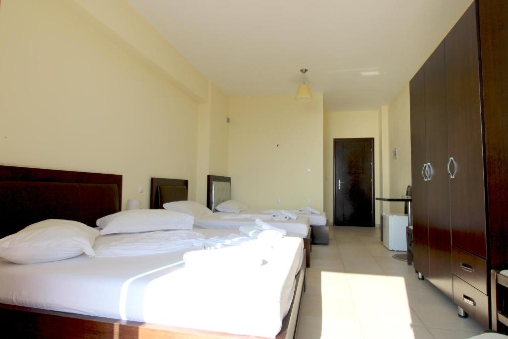 Postel nebo postele na pokoji v ubytování Summer Dream Hotel