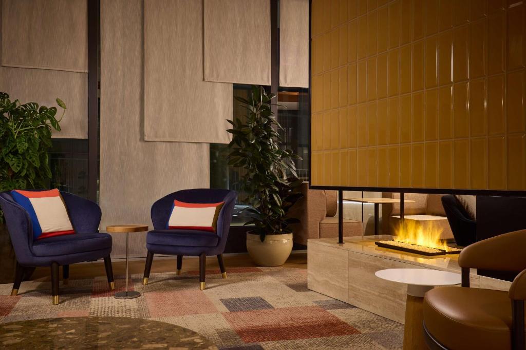 Posezení v ubytování Adina Apartment Hotel Geneva