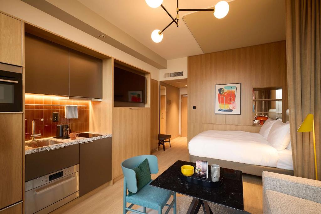 Kuchyň nebo kuchyňský kout v ubytování Adina Apartment Hotel Geneva