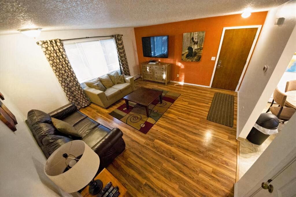 an overhead view of a living room with a couch at Stay Anchorage! Furnished Two Bedroom Apartments With High Speed WiFi in Anchorage