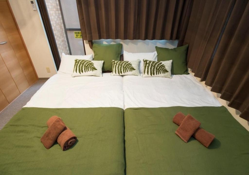 En eller flere senger på et rom på Dia Palace Otemon 203 - Vacation STAY 31915v