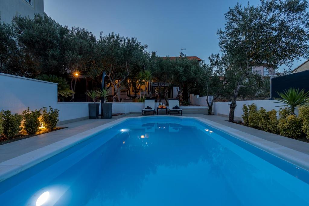 Bazén v ubytovaní Holiday house with a swimming pool Stari Grad, Hvar - 17911 alebo v jeho blízkosti