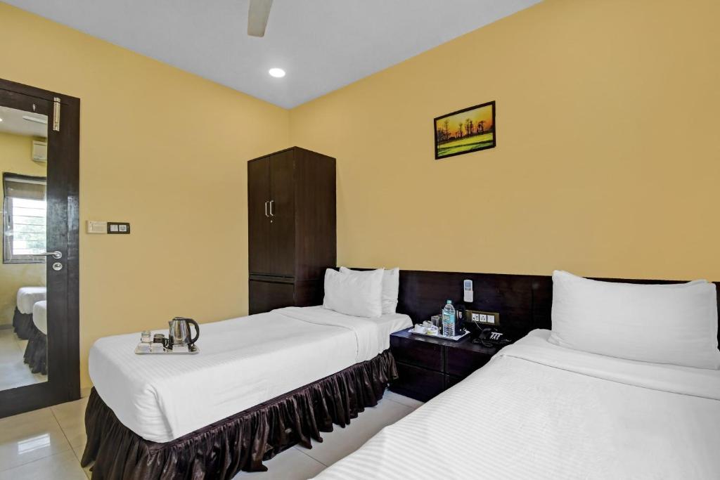 Postel nebo postele na pokoji v ubytování Super Townhouse The Platinum