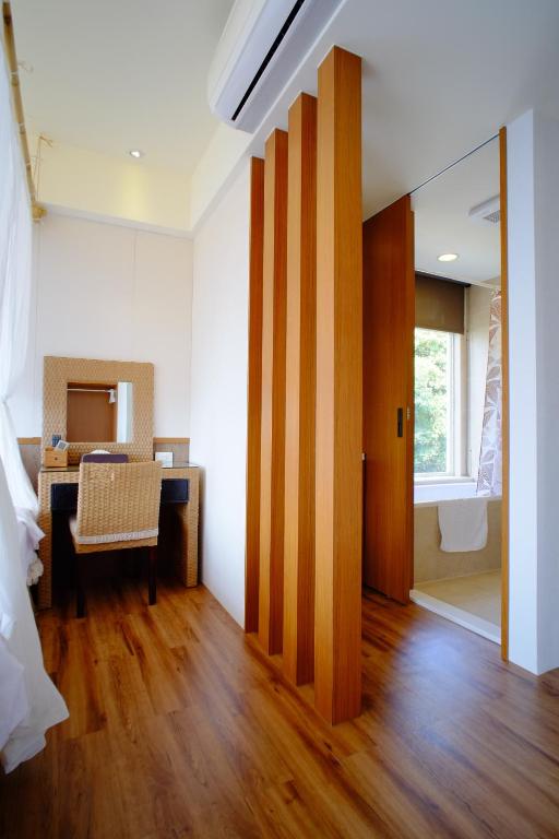 Postel nebo postele na pokoji v ubytování Chiu Chunt Dint B&B