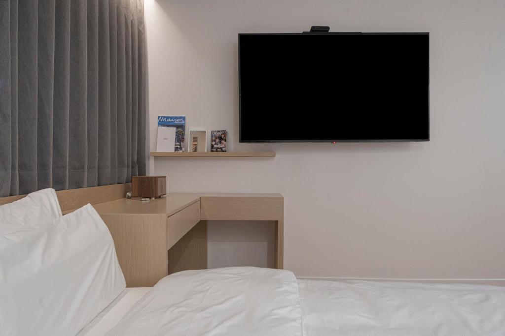 TV a/nebo společenská místnost v ubytování Aank Hotel Daejeon Yuseong 2nd