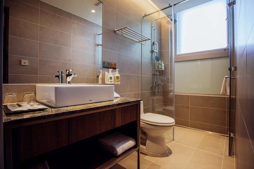 Koupelna v ubytování Hotel BEGINS 倉箱蜜境文旅