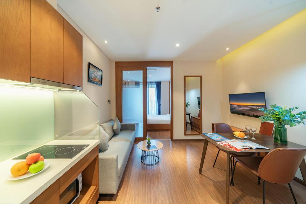 Kuchyň nebo kuchyňský kout v ubytování DHTS Business Hotel & Apartment