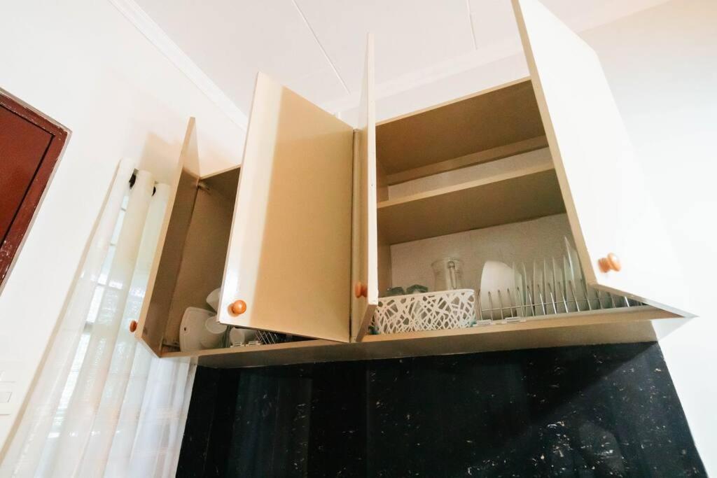 Kuchyň nebo kuchyňský kout v ubytování Cozy BNB - Unit L