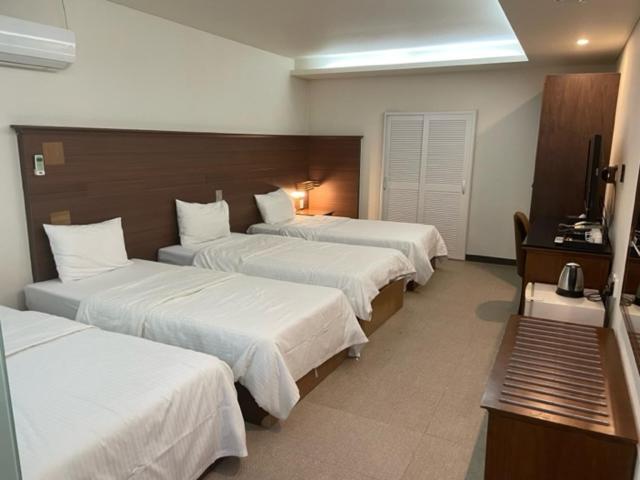 Postel nebo postele na pokoji v ubytování Incheon Airporthotel Airstay