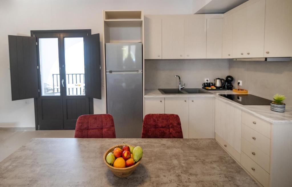 Kuchyň nebo kuchyňský kout v ubytování White Breeze Villas