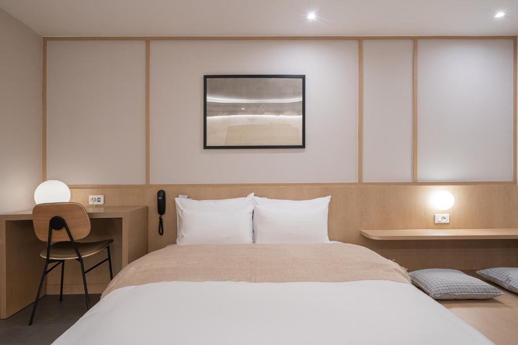 Postel nebo postele na pokoji v ubytování Aank Hotel Daejeon Yongjeon 1st