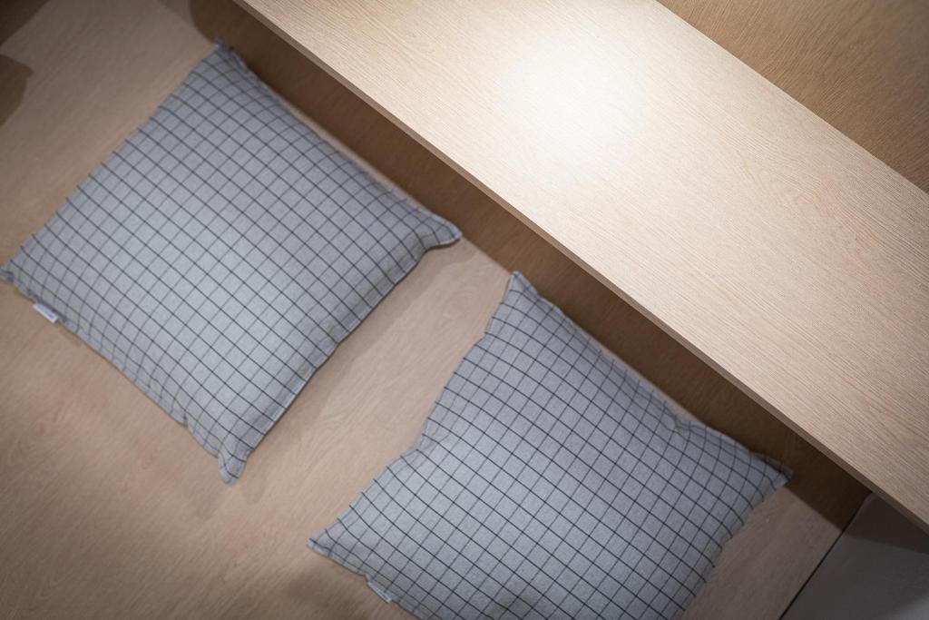 Postel nebo postele na pokoji v ubytování Aank Hotel Daejeon Yongjeon 1st