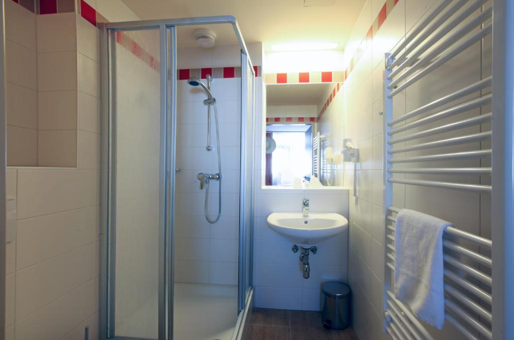 Koupelna v ubytování JUFA Hotel Planneralm