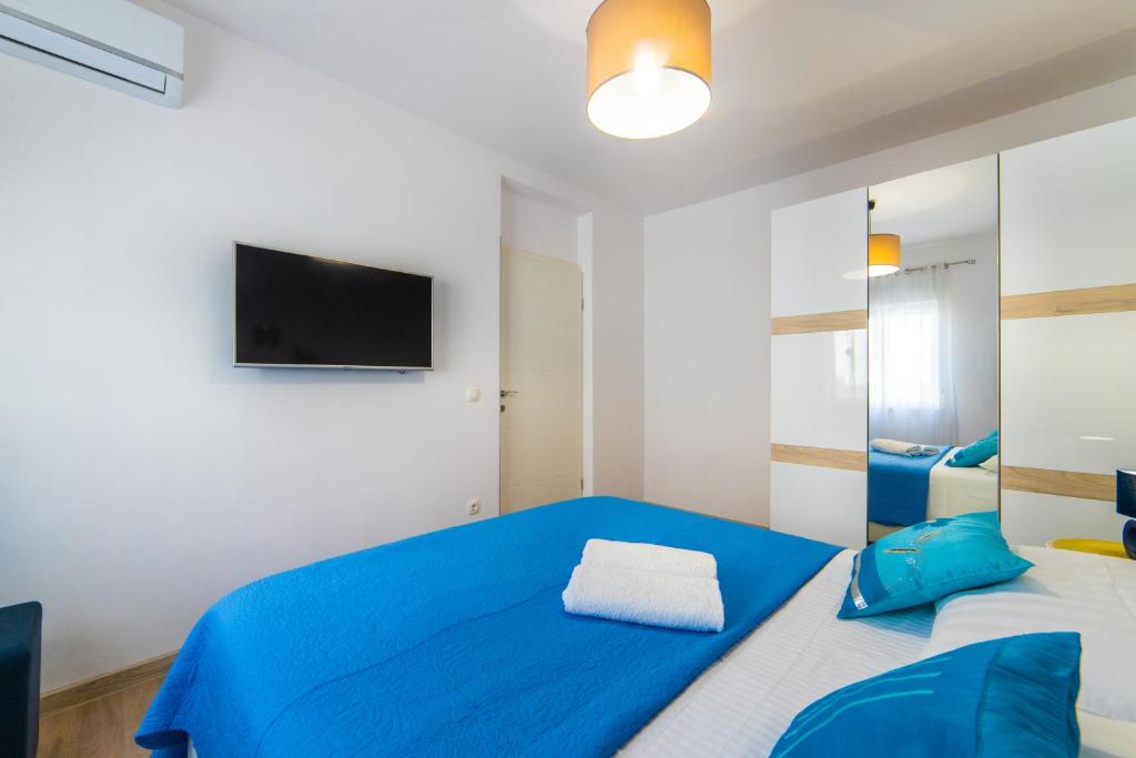 Postel nebo postele na pokoji v ubytování Apartment Karlo - Grad Ploče, Croatia