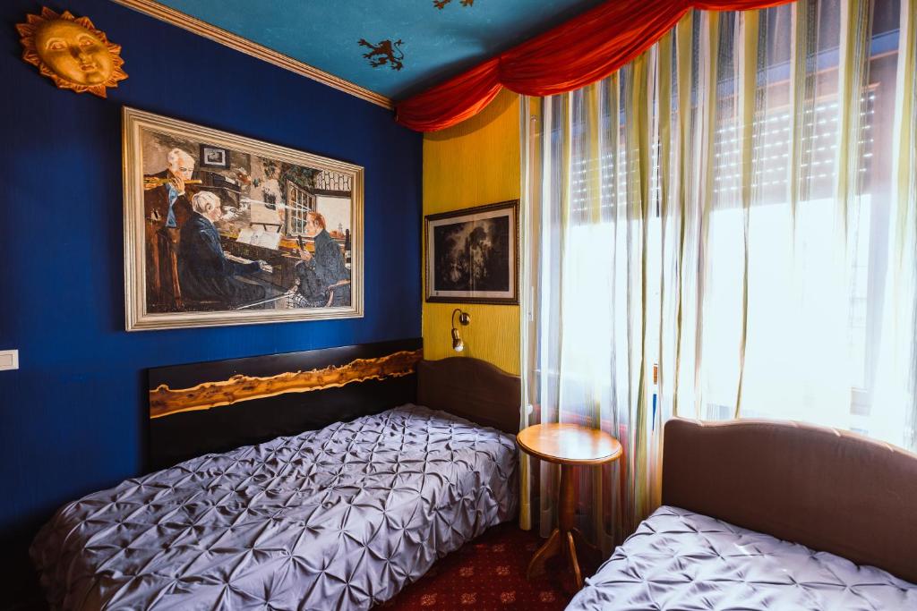 Postel nebo postele na pokoji v ubytování Design Hotel Euskirchen