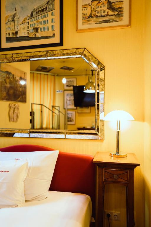 Postel nebo postele na pokoji v ubytování Design Hotel Euskirchen
