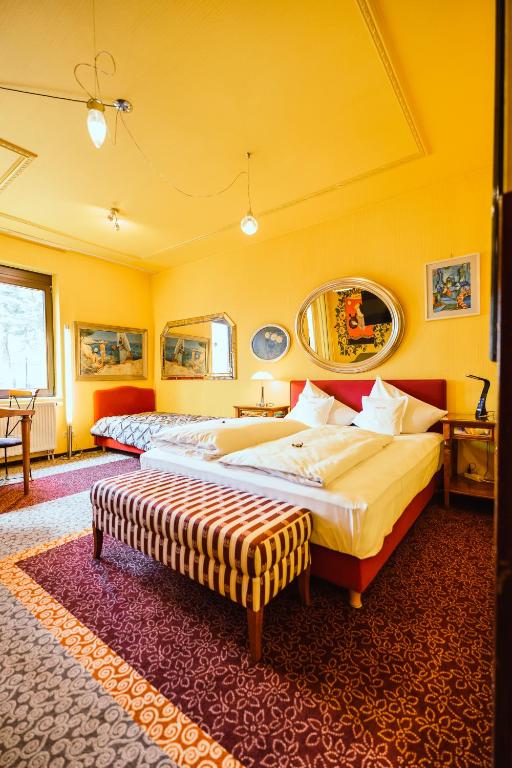 Postel nebo postele na pokoji v ubytování Design Hotel Euskirchen