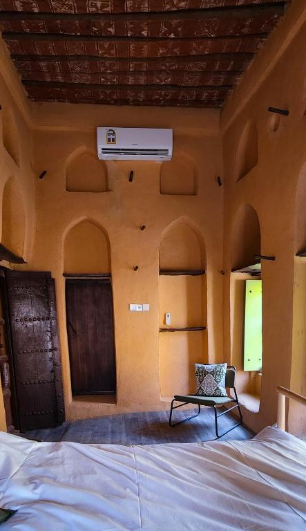 Postel nebo postele na pokoji v ubytování Bait Al Aali Guesthouse