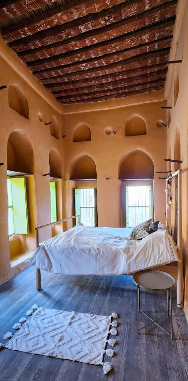 Postel nebo postele na pokoji v ubytování Bait Al Aali Guesthouse