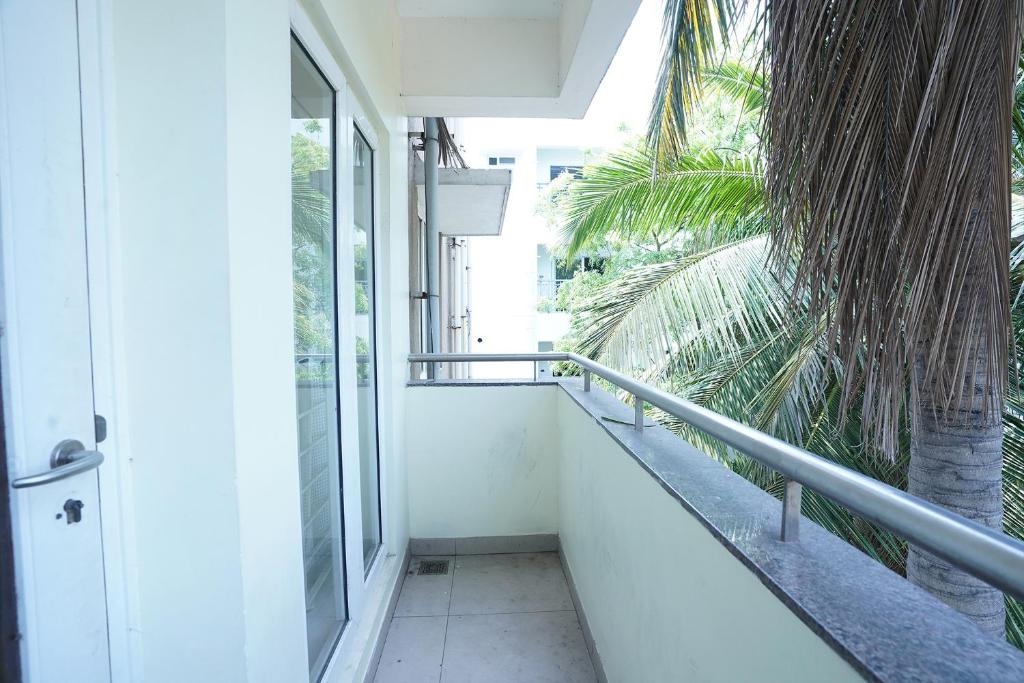 Fotografie z fotogalerie ubytování FabHotel Home Tree Service Apartment - Nr Anna Tower v destinaci Čennaí
