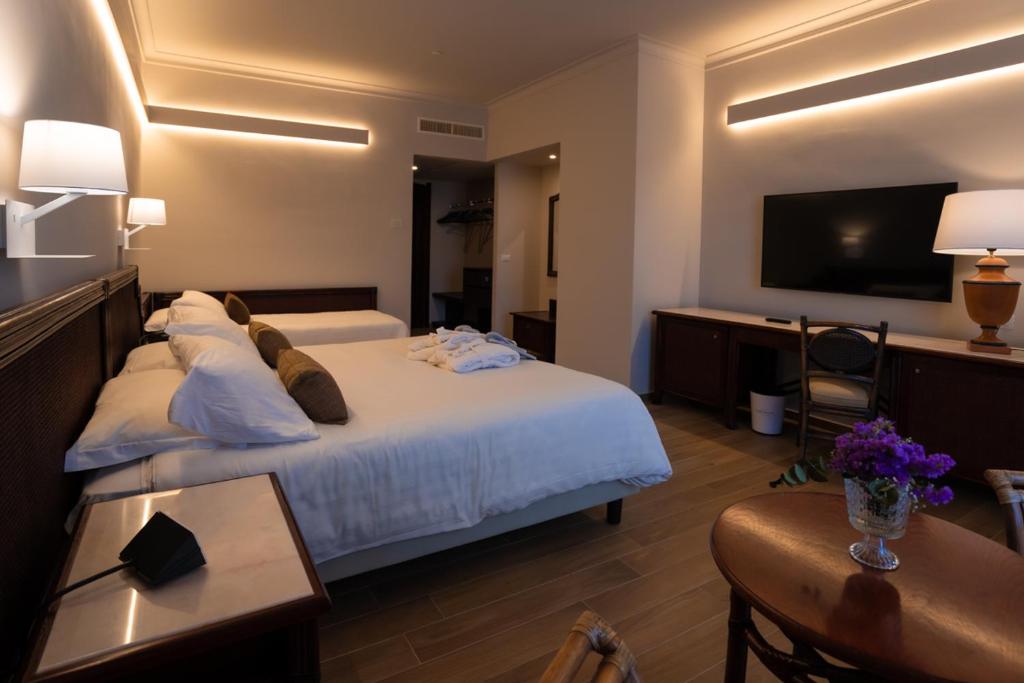 Łóżko lub łóżka w pokoju w obiekcie Hotel Schuhmann