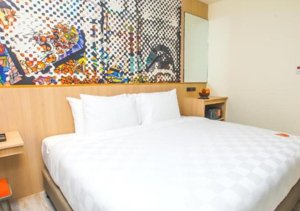 Postel nebo postele na pokoji v ubytování Go Hotels Plus Naga