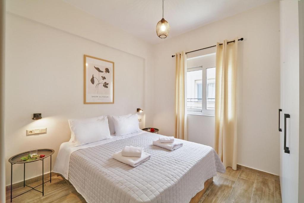 A bed or beds in a room at Friday Collection