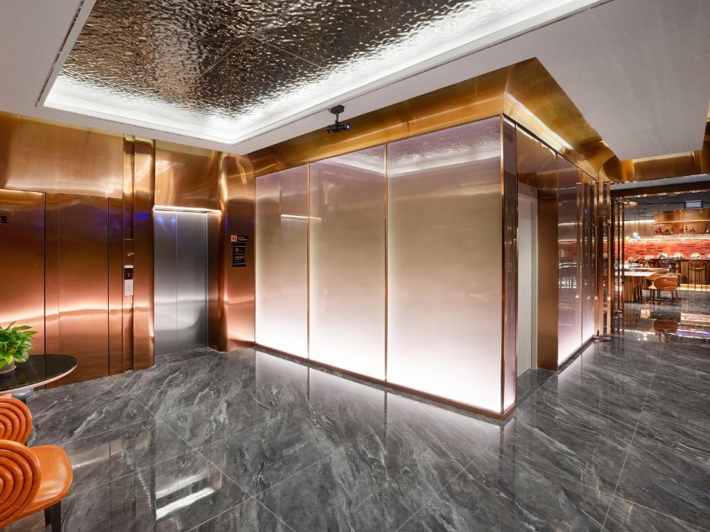 Fotografie z fotogalerie ubytování Echarm PLUS International Hotel Zhujiang New Town Wuyangcun Metro Station - Free Deliver Service to Canton Fair Complex During Canton Fair Period v Kantonu