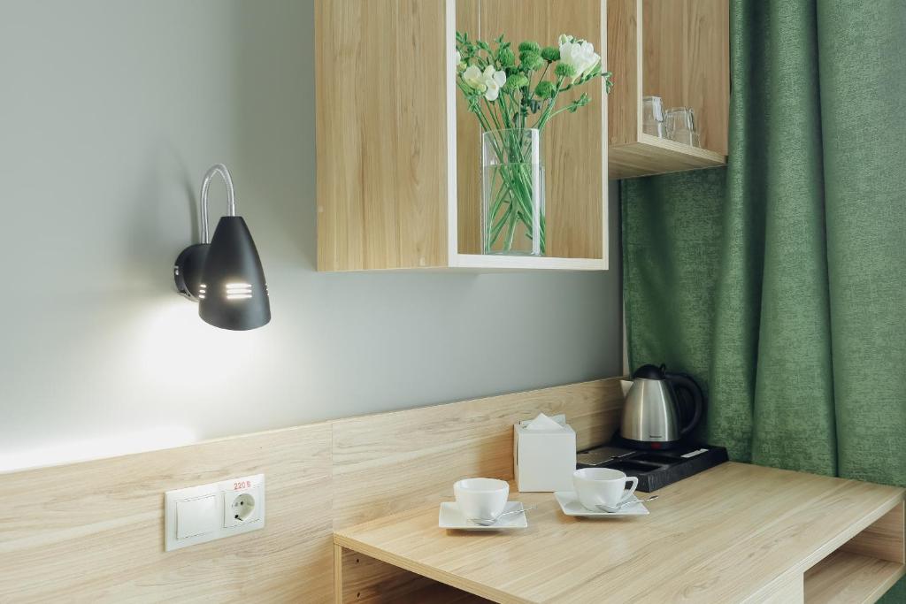 Příslušenství pro přípravu čaje a kávy v ubytování Hotel Vesna