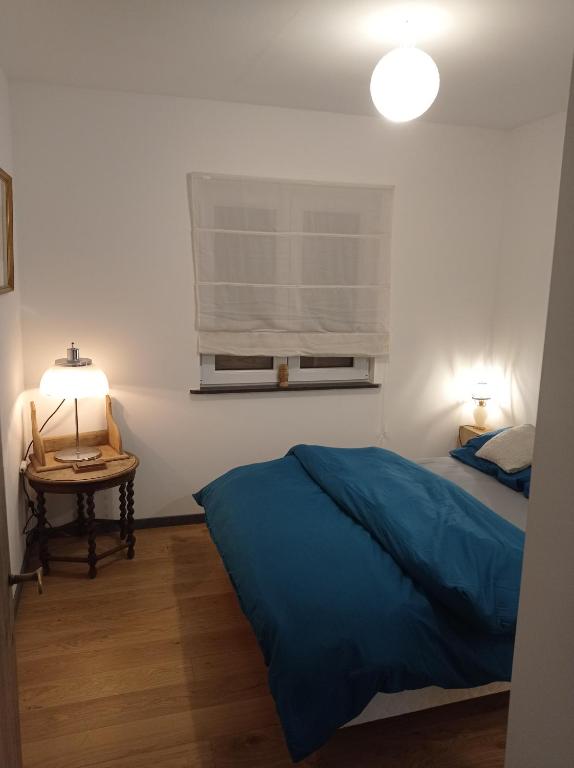 Postel nebo postele na pokoji v ubytování le chalet des remparts