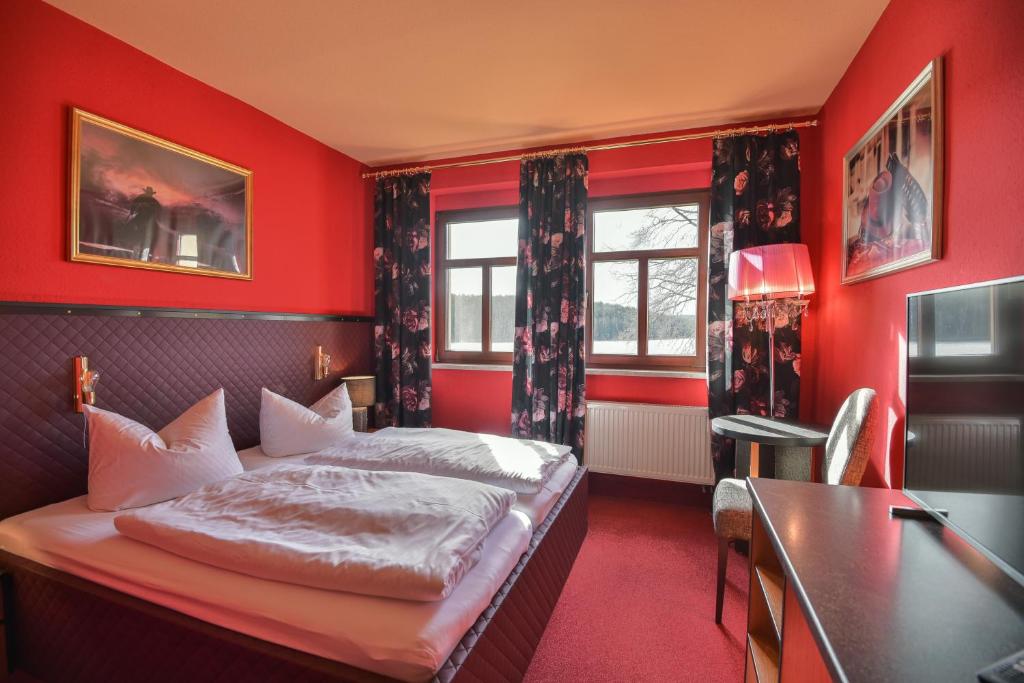 Voodi või voodid majutusasutuse Riverdam Boutique Hotel toas
