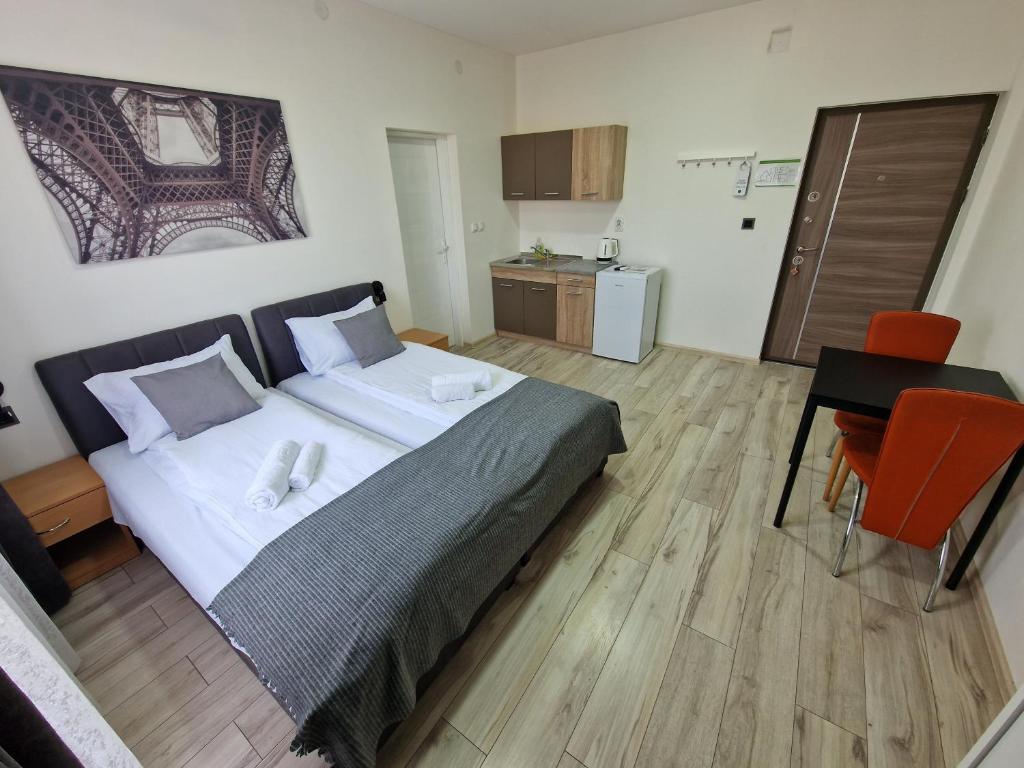 Postel nebo postele na pokoji v ubytování Vurk INN Paracin