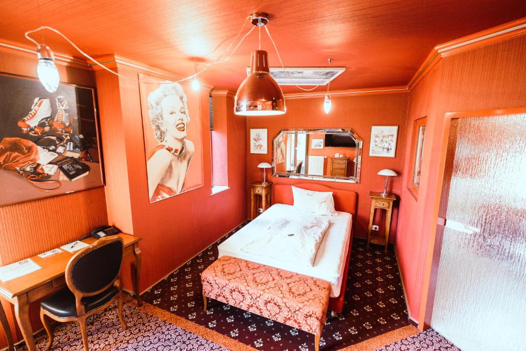 Postel nebo postele na pokoji v ubytování Design Hotel Euskirchen